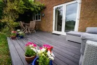 HD Deck 3D+ in black oak used for a garden patio - Composite Prime